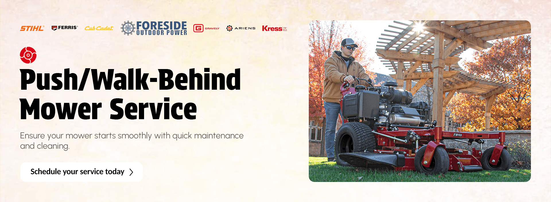Technician performing seasonal maintenance on a push mower at Foreside Outdoor Power.